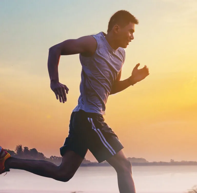Runner training outdoors — physiotherapy and rehabilitation at InSync Wellness in Brampton